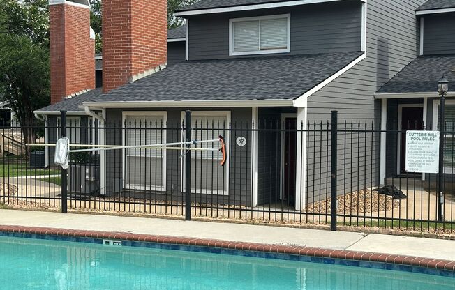 College Station - 2 bedroom / 2.5 bath Condo - 2 story with covered parking - Pool in your front yard.