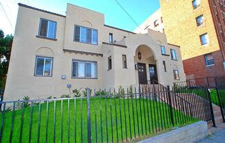 Normandie Apts...Stunning 2 bed/1bath Completely Remodeled w/Washer Dryer and Parking!