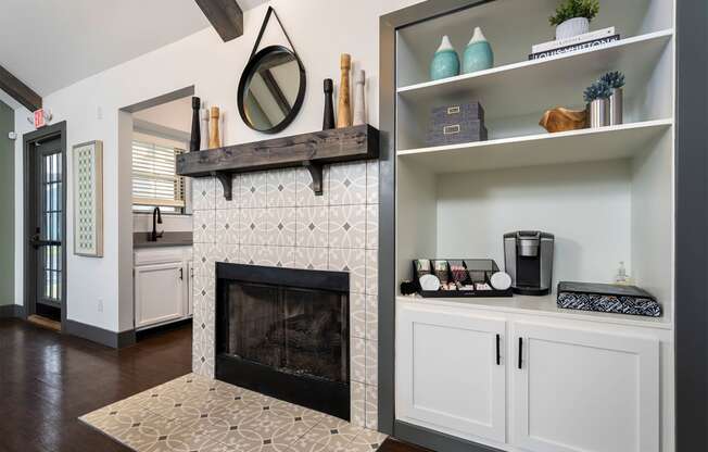 resident club house with fireplace and keurig coffee station