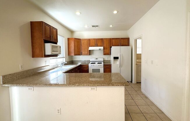 Cozy two-story property tucked into a gated community in the heart of Las Vegas.