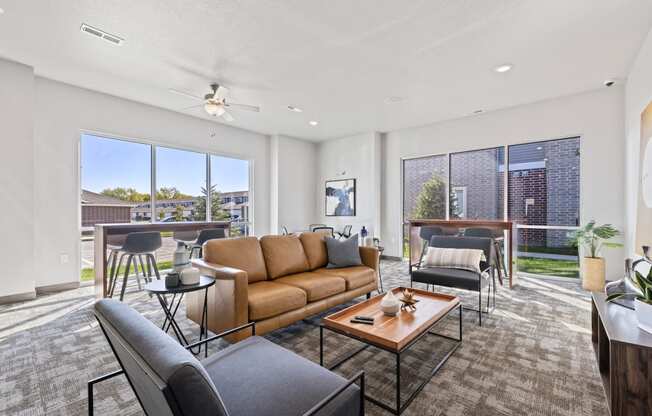 Spacious living room with neutral walls and ample natural light.