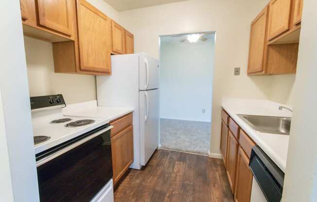 This is a photo of the kitchen in the 652 square foot, 1 bedroom, 1 bath A-style apartment at Blue Grass Manor Apartments in Erlanger, KY.