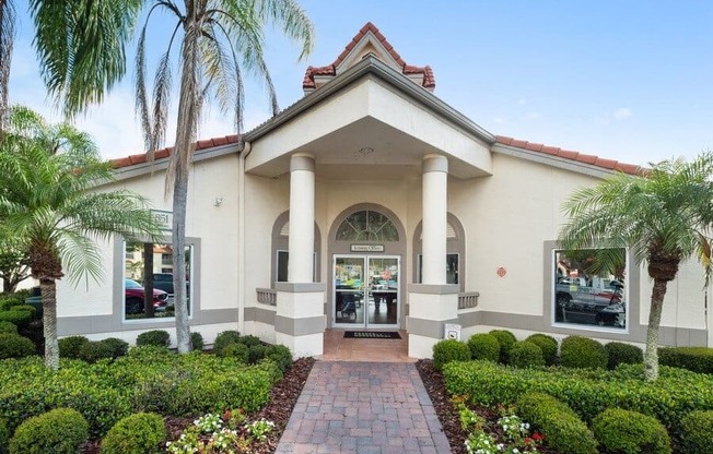Clubhouse front entrance and well kept landscape