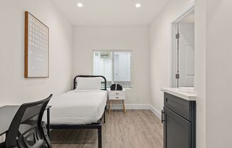 A 5 bedroom, 3 bathroom apartment with common areas and a fully functional kitchen at 1738 Kelton Ave.