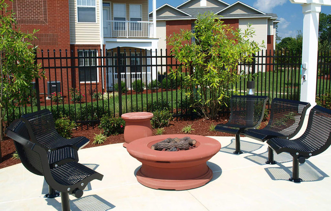 outdoor firepit and seating area daytime
