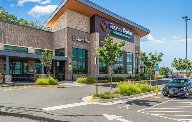 a health center building with a car parked in front of it