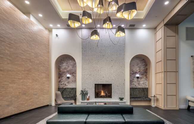 a living room with a fireplace and a couch