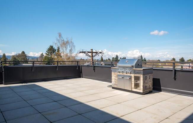 Slogan Apartments | Roof top BBQ Area