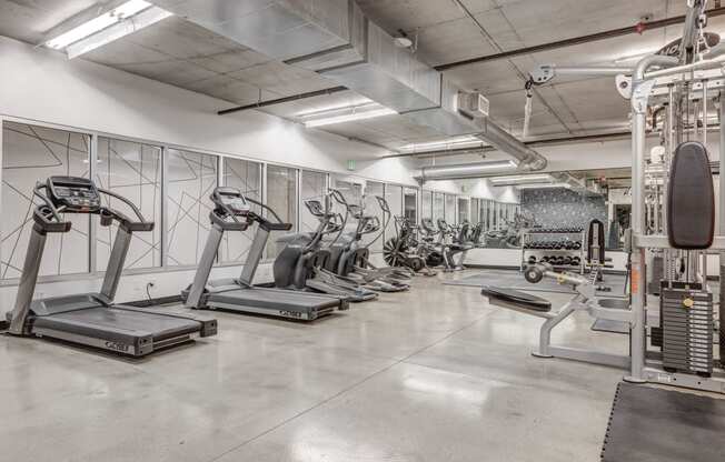 the gym at theia on the park condos