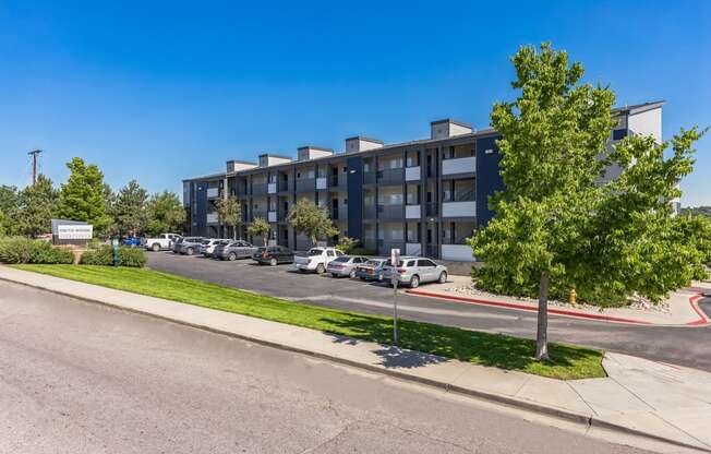 a view of an apartment building from the street