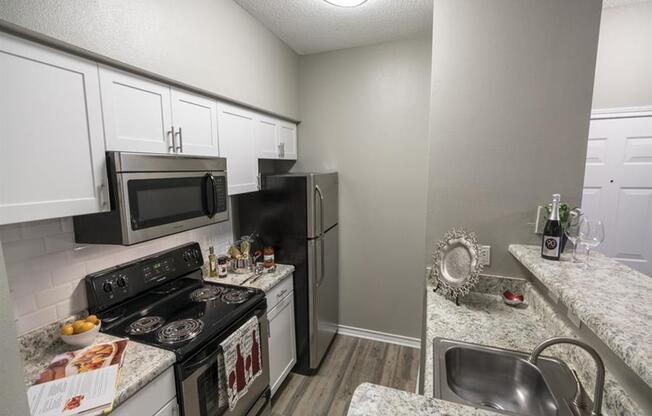 Stainless Steel Sink With Faucet In Kitchen at Wyndchase at Aspen Grove, Franklin, 37067