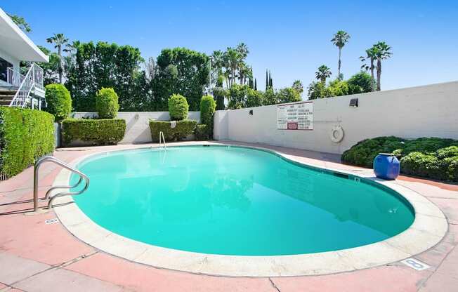 the swimming pool at the villa apartments