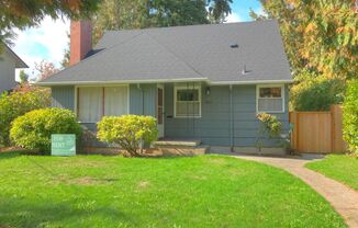 Arbor Lodge Mid-Century in Quiet Neighborhood with Hardwood Floors, Huge Basement, Fully Fenced Yard