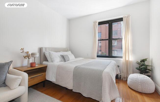 312 W 23 ST