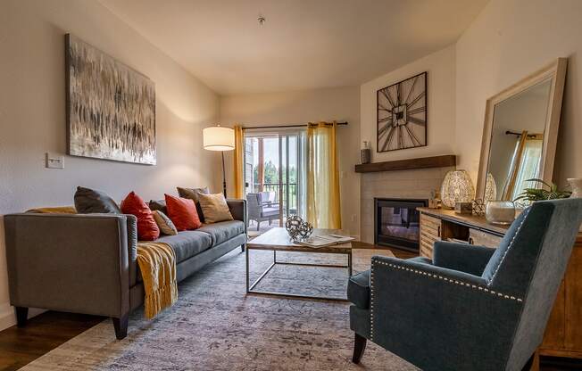 Living room with fireplace and sliding door to patio