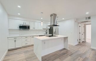 QUALITY DESIGNER Remodeled Condo in a Guard Gated Community!