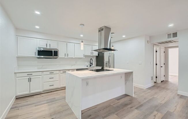 QUALITY DESIGNER Remodeled Condo in a Guard Gated Community!
