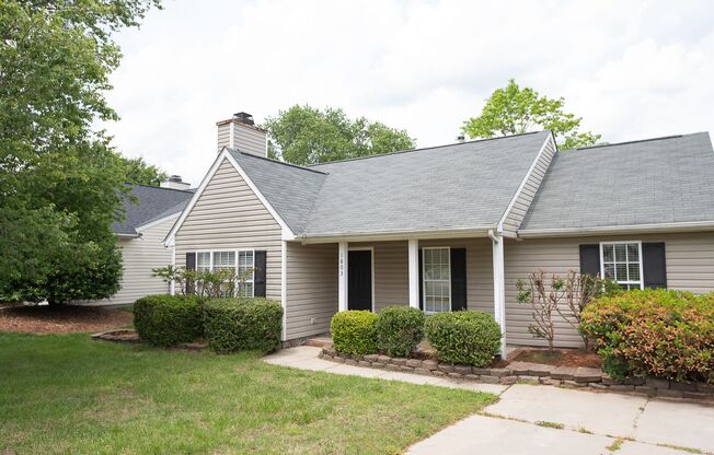 Charming 3 bedroom 2 bath ranch style home in Greensboro with covered front porch!