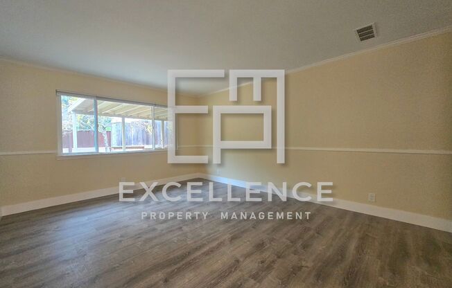 4/2 House with Large Yard, AC, New Flooring, Walk to Schools!