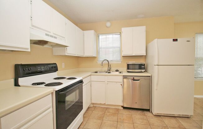 Charming 3-Bedroom, 2-Bath Brick Townhome | Available for Tours July 11th