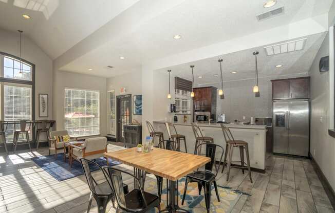 a dining room and kitchen with a table and chairs at Radbourne Lake Apartments, Charlotte, NC ? 