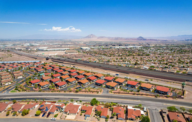 A suburban neighborhood with houses and streets.