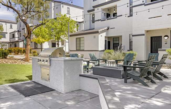 Grill, chill, and unwind in style at the Michael B apartment complex's inviting outdoor patio, where good times and great food come together seamlessly.at The Michael B Townhomes and Flats, Las Vegas,