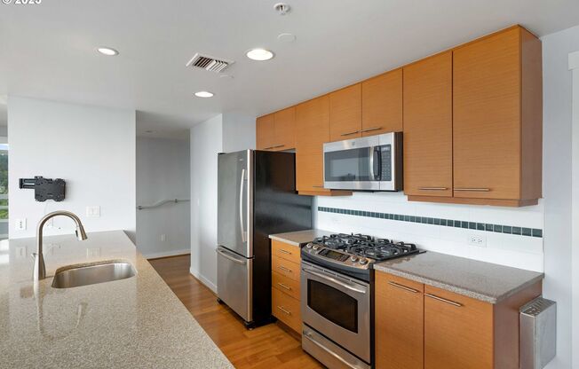 Modern 2-Bed/2-Bath Condo with Balcony, Parking & Prime Downtown Location
