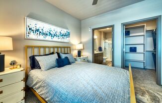 Bedroom with bed and bathroom at Cuvee, Glendale Arizona 