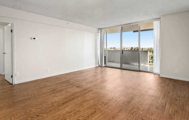 Living Room with Balcony and Hard Surface Flooring