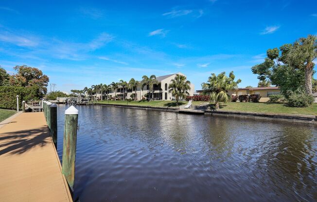 Furnished Gulf Access Canal Condo 2 bed with Dock Space