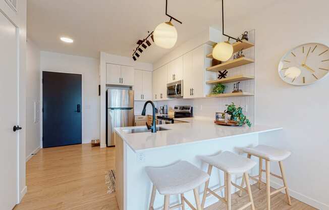 Kitchen with counter table at CityLine Apartments, Minneapolis, MN