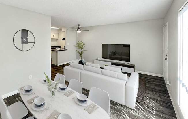 A modern dining room with a white table set for six.