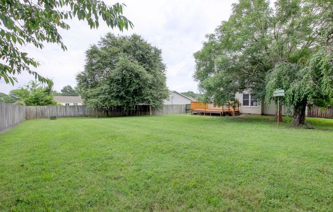 Sunny home with a big fenced yard in a great location!