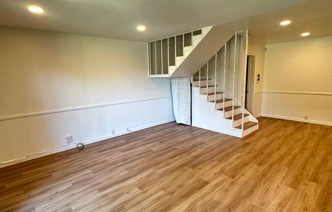Spacious 3BR/2.5BA updated 2-story townhouse for rent with fenced patio, 2 parking spaces and more