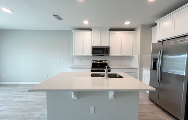 Brand-New 3/2.5 Modern Townhome in Gated Tyson Ranch – Minutes from Lake Nona
