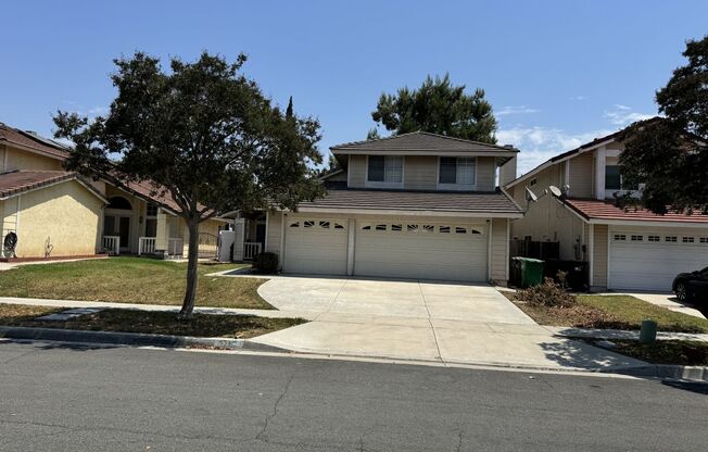 4 bed 3 full bath house with 3 car attached garage in Corona