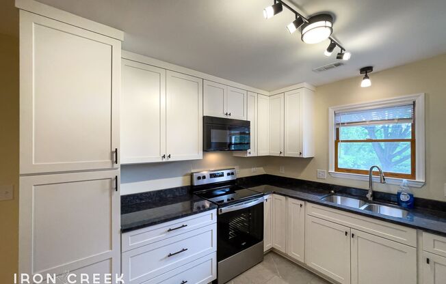 Beautifully Updated Three-Bedroom with Garage and Included Electric