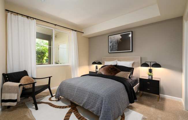 a bedroom with a bed and a window