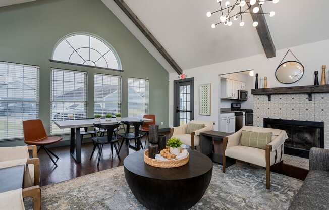 apartment club house lounge with large windows and kitchen