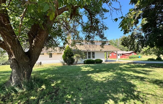 West Valley 3 bedroom country home with 3 bay shop