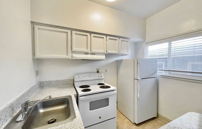 1204 P &amp; 1601 12th St - The State House Apartments