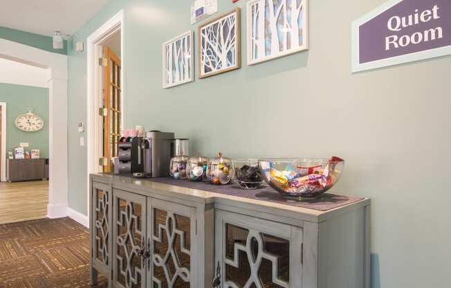 Cozy coffee area with a modern setup for residents to enjoy at Angel Landing apartments in Pensacola, FL