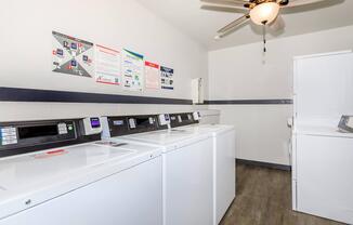 a kitchen with a sink and a refrigerator