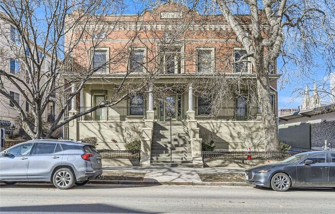 PRICED REDUCED!! Large windows and exposed brick wall