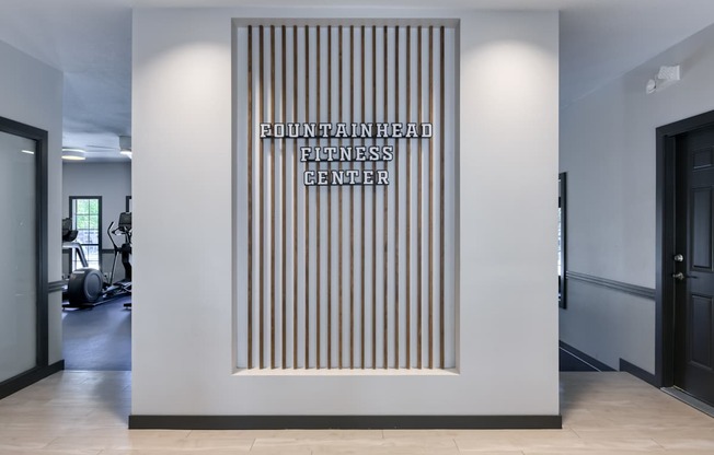 A wall with a sign that says "Fountainhead Plastic Surgery Center".