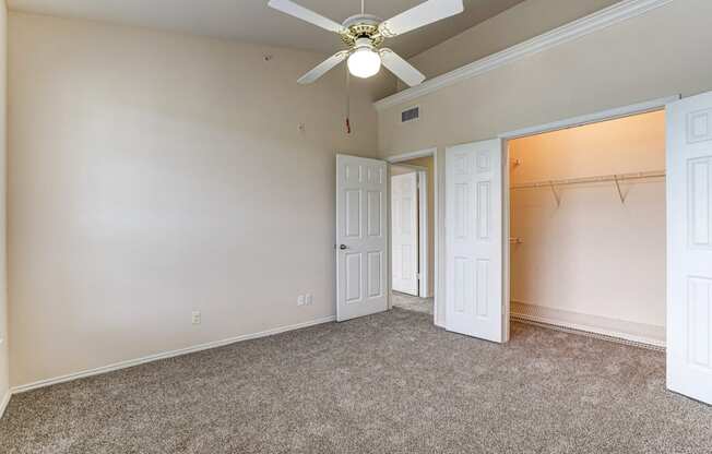 Large bedrooms with spacious closet space at Turnberry Isle Apartments in Dallas, TX.