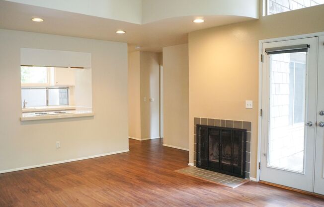 Gorgeous & Bright 1-Bed w/ Wood-Burning Fireplace, W/D, & Private Patio!