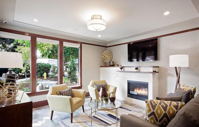 A living room with a fireplace and a couch.