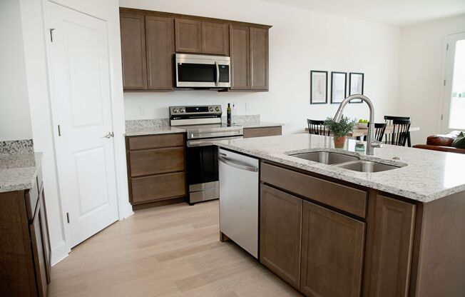 Brand New Construction Townhomes Await at Clover Ridge! Washer & Dryer provided